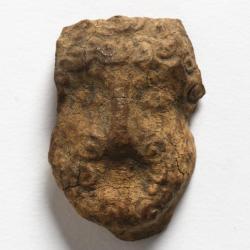 Fragment de vase à visages